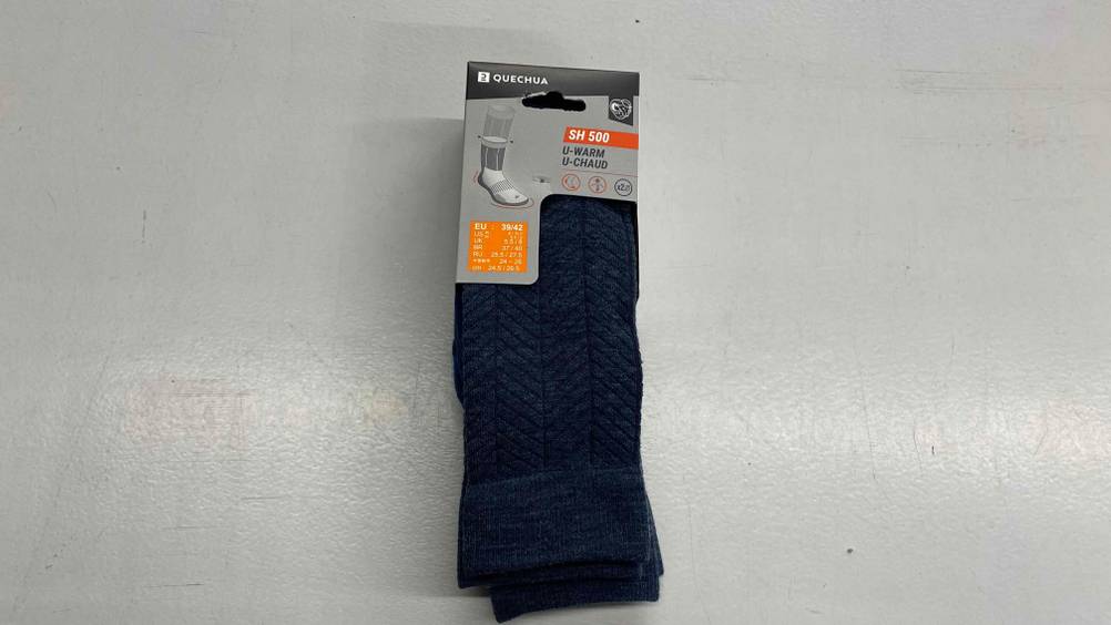 Wintersocke von Quechua im Test: Socken liegen auf hellem Untergrund.