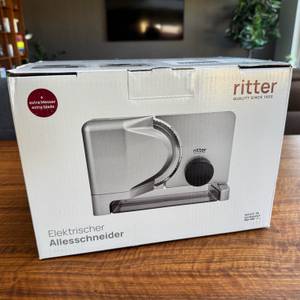 Der Karton der Ritter E16 Duo Plus steht auf einem Tisch