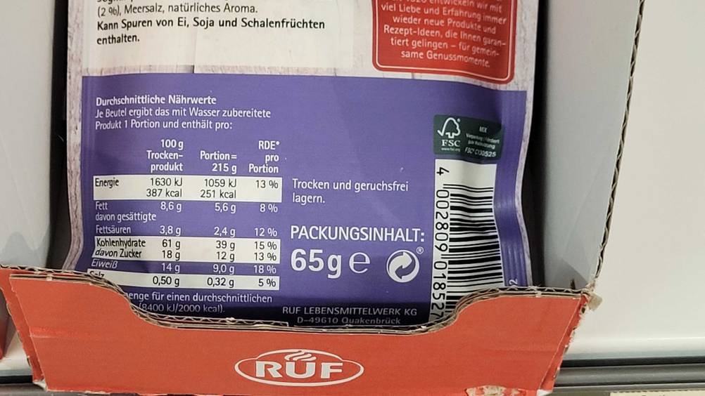Instant-Oats im Test: Detailaufnahme einer 65-g-Packung der Marke Ruf, mit Fokus auf die durchschnittlichen Nährwerte-Informationen.