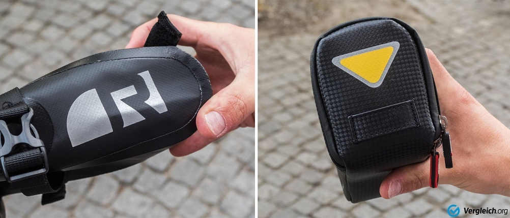 Die Reflektoren bei zwei Satteltaschen fürs Fahrrad werden inspiziert.