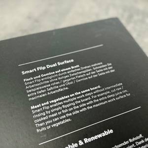 Die Verpackung zeigt die Smart-Flip-Dual-Surface-Funktion des Redsalt-Bambusbretts in deutscher und englischer Sprache.