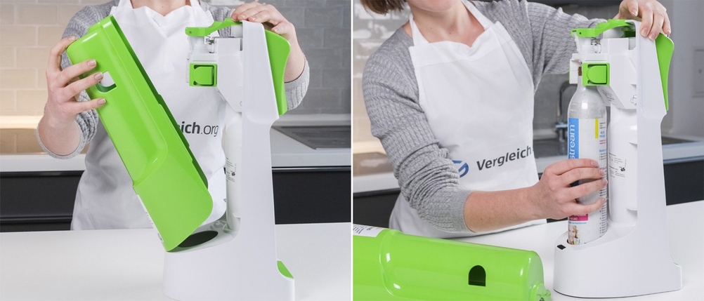 Der Zylinder eines Wassersprudlers wird gewechselt.