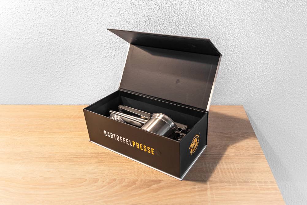 Spätzlepresse mit wiederverwendbarer Verpackung