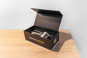 Spätzlepresse mit wiederverwendbarer Verpackung