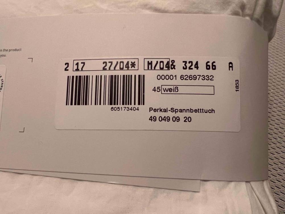 Ein Spannbettlaken mit den Maßen 200x200 cm im Test: Barcode von einer Verpackung. 