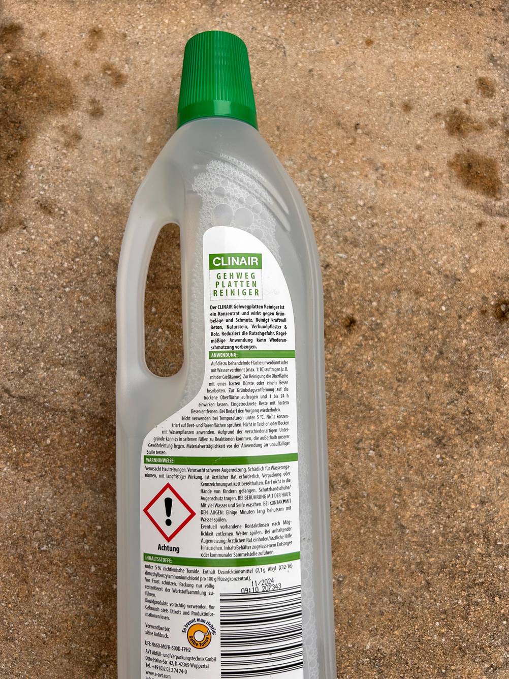 Rückseite von einer Flasche steinreiniger