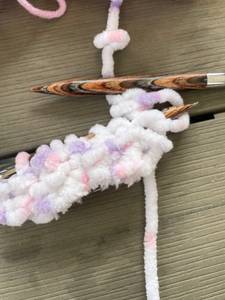 Stricknadeln mit Wollfaden