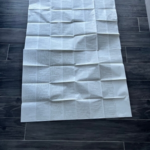 Die aufgefaltete Bedienungsanleitung des Reisewasserkochers.