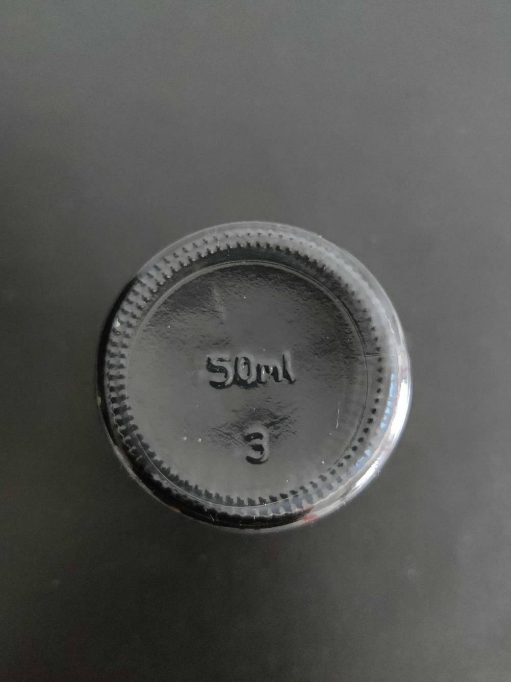 Textilfarbe getestet: Boden der Verpackung.