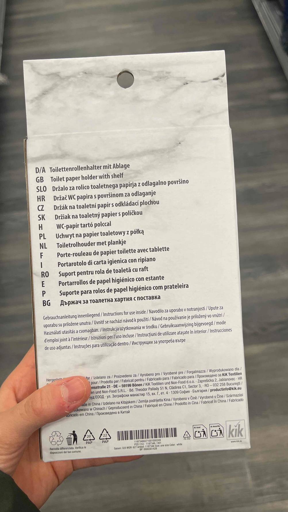 Toilettenpapierhalter-Test: Die Rückseite der Verpackung mit Informationen.