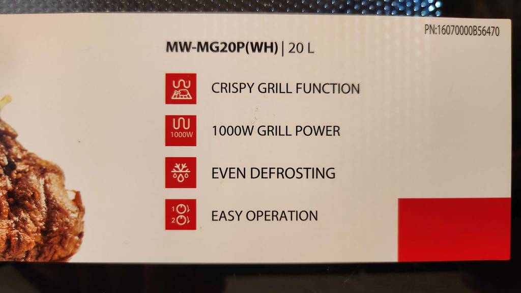 Auf dem Karton einer getesteten Toshiba-Mikrowelle stehen die Funktionen.