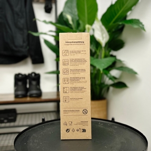 Die Rückseite der Verpackung der 720°Dgree uberBottle zeigt Symbole und Anwendungshinweise. Auch Reinigungshinweise sind abgebildet.