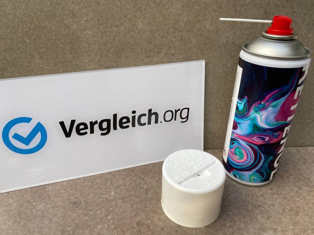 Kettenöl-Dose geöffnet steht vor vergleich.org-werbung