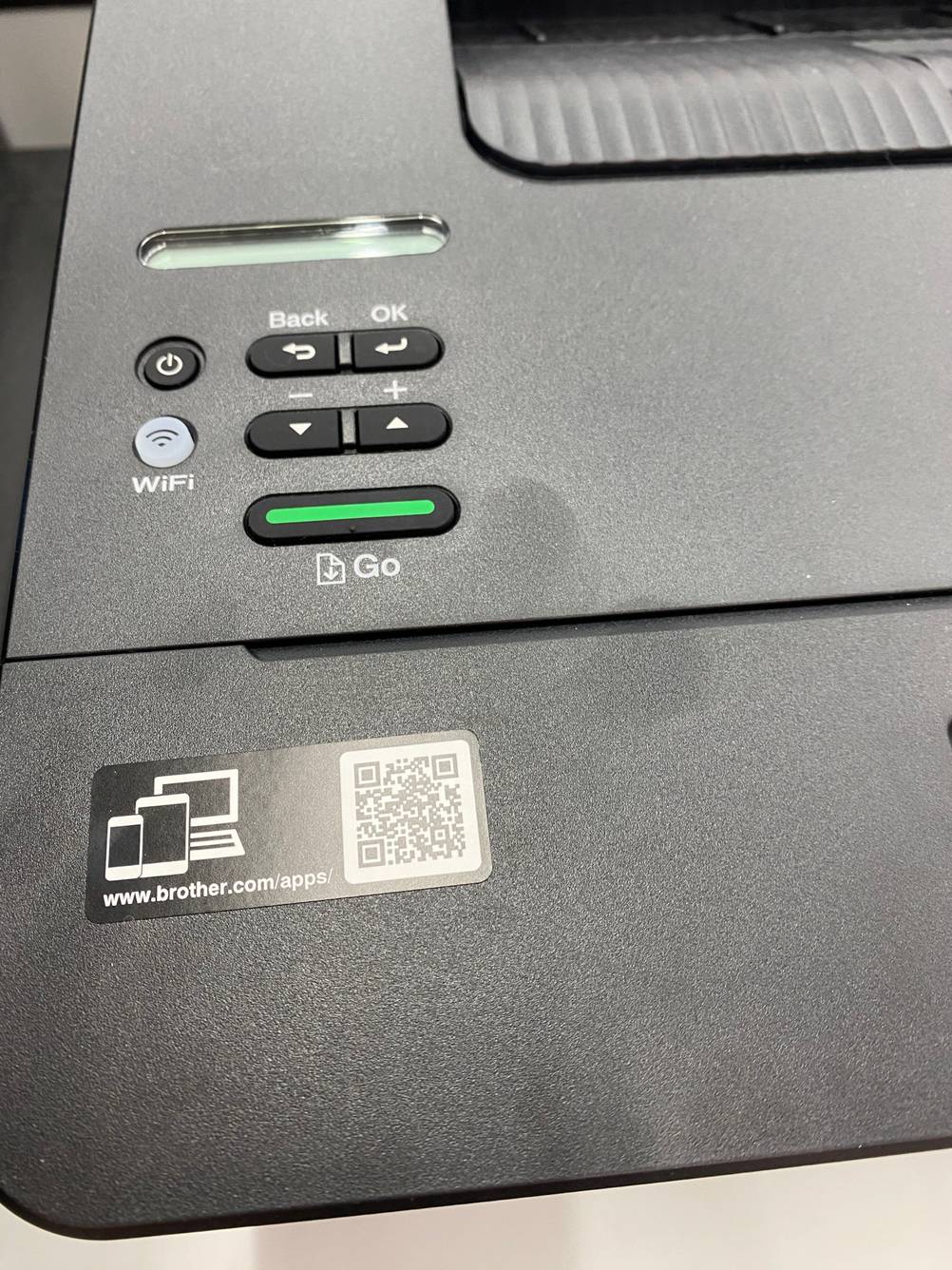 Multifunktionsdrucker: Brother-Drucker schneiden immer gut in Tests ab. Nachansicht der Tasten eines Druckers.
