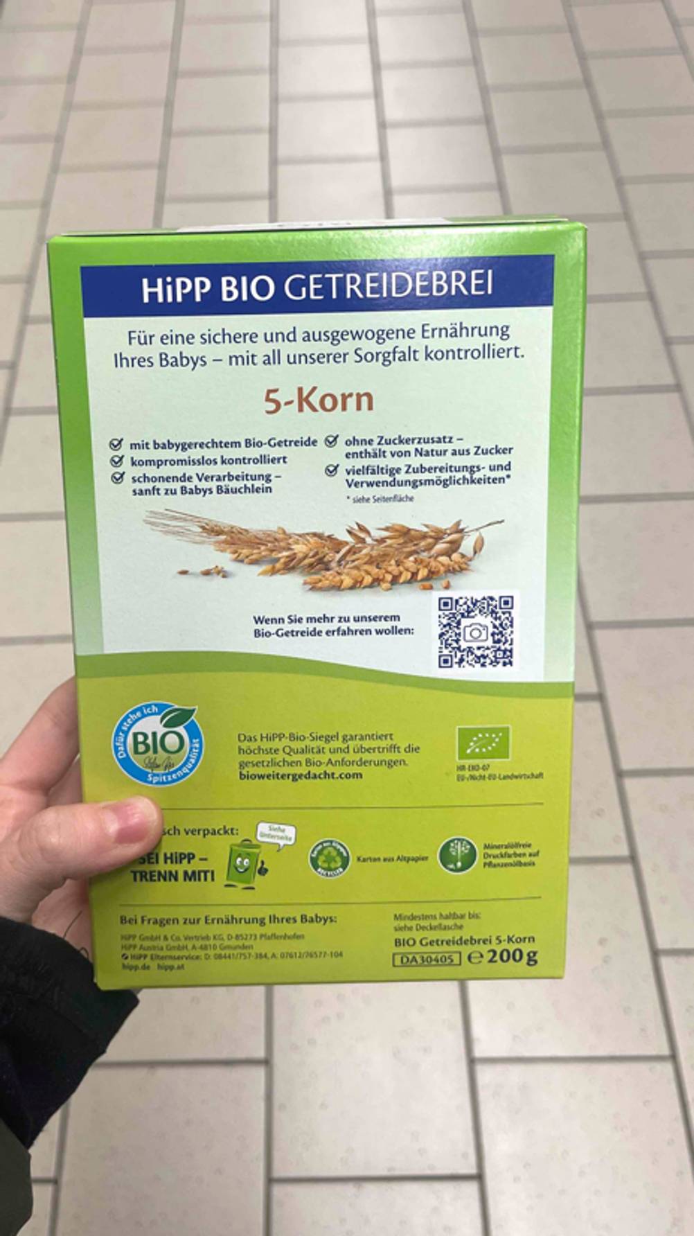 Im Test: Der Getreidebrei aus 5-Korn befindet sich in der grünen Packung inklusive Produktinformationen.