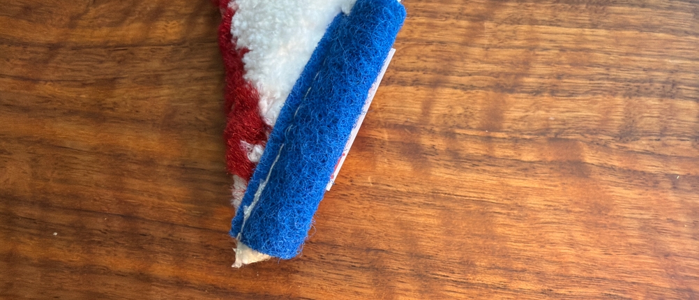 Ein Stoff an der Seite vom Wischer des Vileda 123400