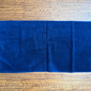 Ein Vossen-Vienna-Style-Supersoft-Handtuch liegt ausgebreitet auf einem Tisch