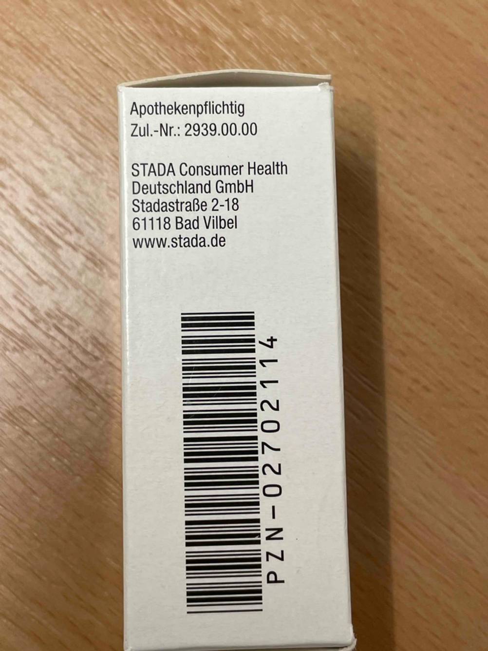 Seitenansicht der Verpackung mit Strichcode eines getesteten Warzenmittels.