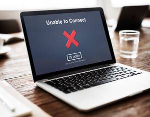 Webhosting getestet: Der Bildschirm eines Laptops zeigt an, dass eine Verbindung zur Seite nicht möglich ist.