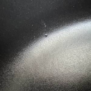 Ein Einschluss im rauen Material des WMF 571464290