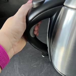 Knopf drücken, ergonomischer Griff beim WMF-Stelio