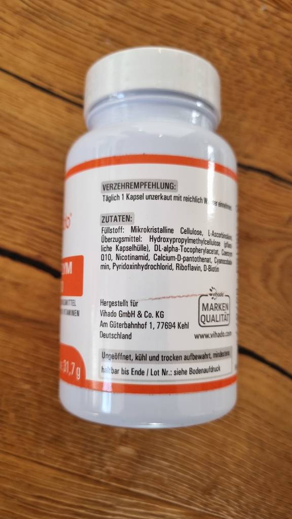 Rückseite der Verpackung mit Dosierungsanleitung