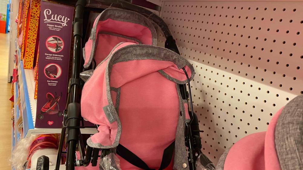 Getesteter Zwillingspuppenwagen mit Sicherheitsgurt. 